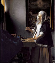 Woman Holding A Balance, by Jan Vermeer