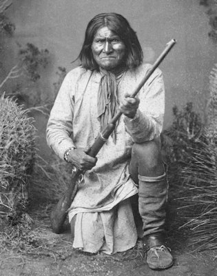 Geronimo with rifle, 1887