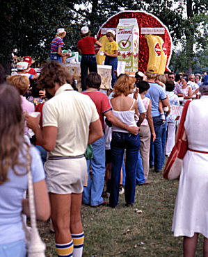 The long line for a serving from the 1-ton banana pudding at the 1981 Banana Festival, Fulton KY - S. Fulton TN