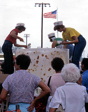 Ol' Glory waves over the last dregs of the 1-ton banana pudding at the 1981 Banana Festival, Fulton KY - S. Fulton TN